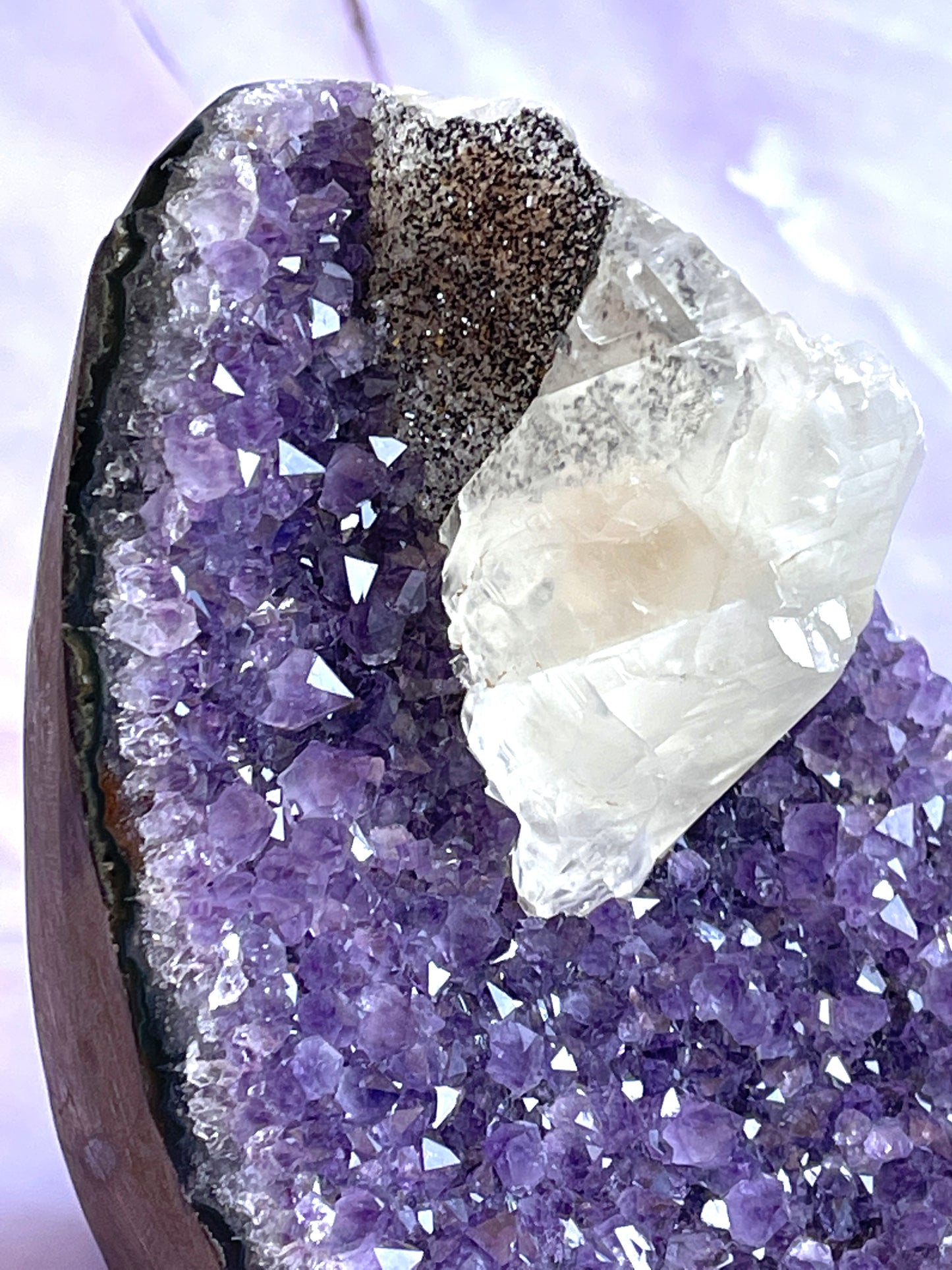 Amethyst flat base with calcite and black sugar druzy