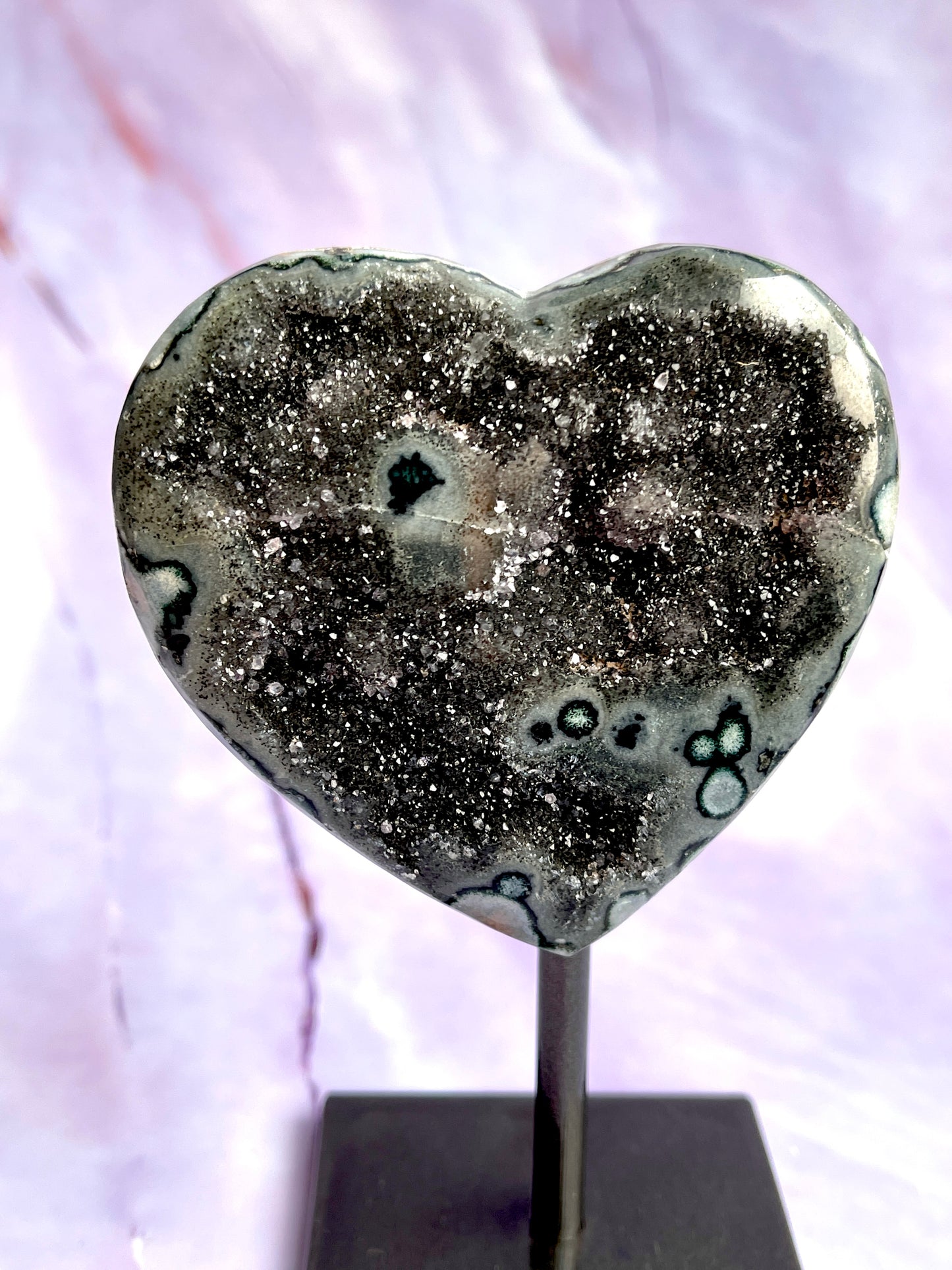 Jasper druzy heart on a fixed stand.