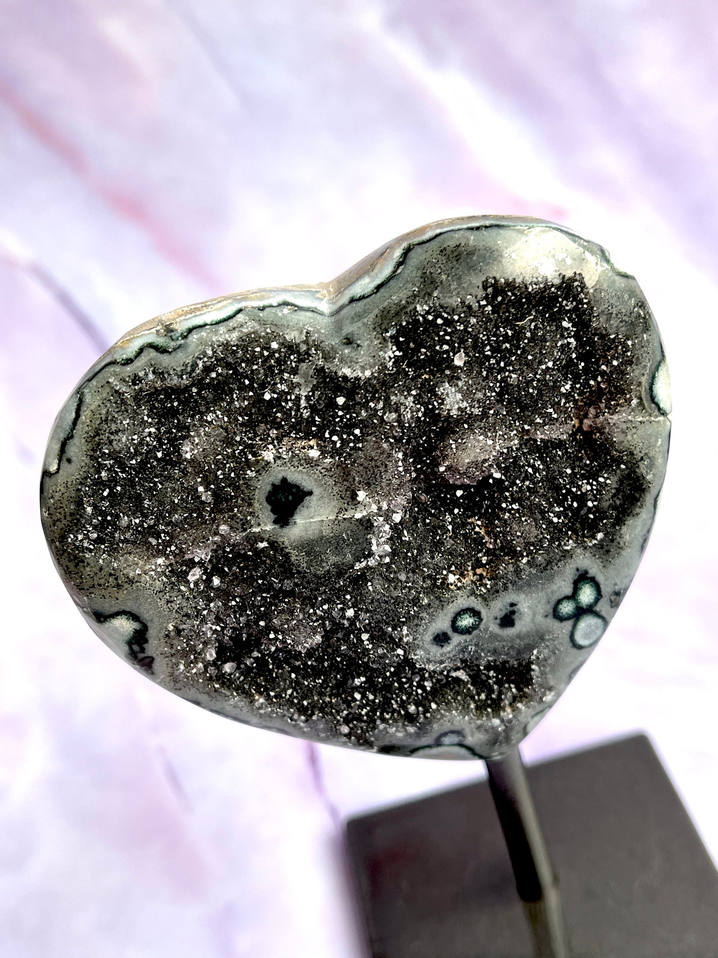 Jasper druzy heart on a fixed stand.